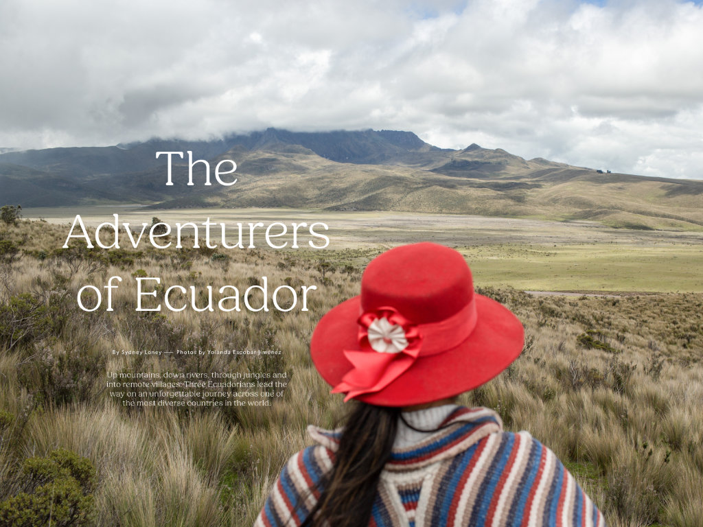 person facing open field and mountains